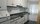 Cocina amplia y luminosa para estudiantes en Santiago centro con electrodomésticos modernos